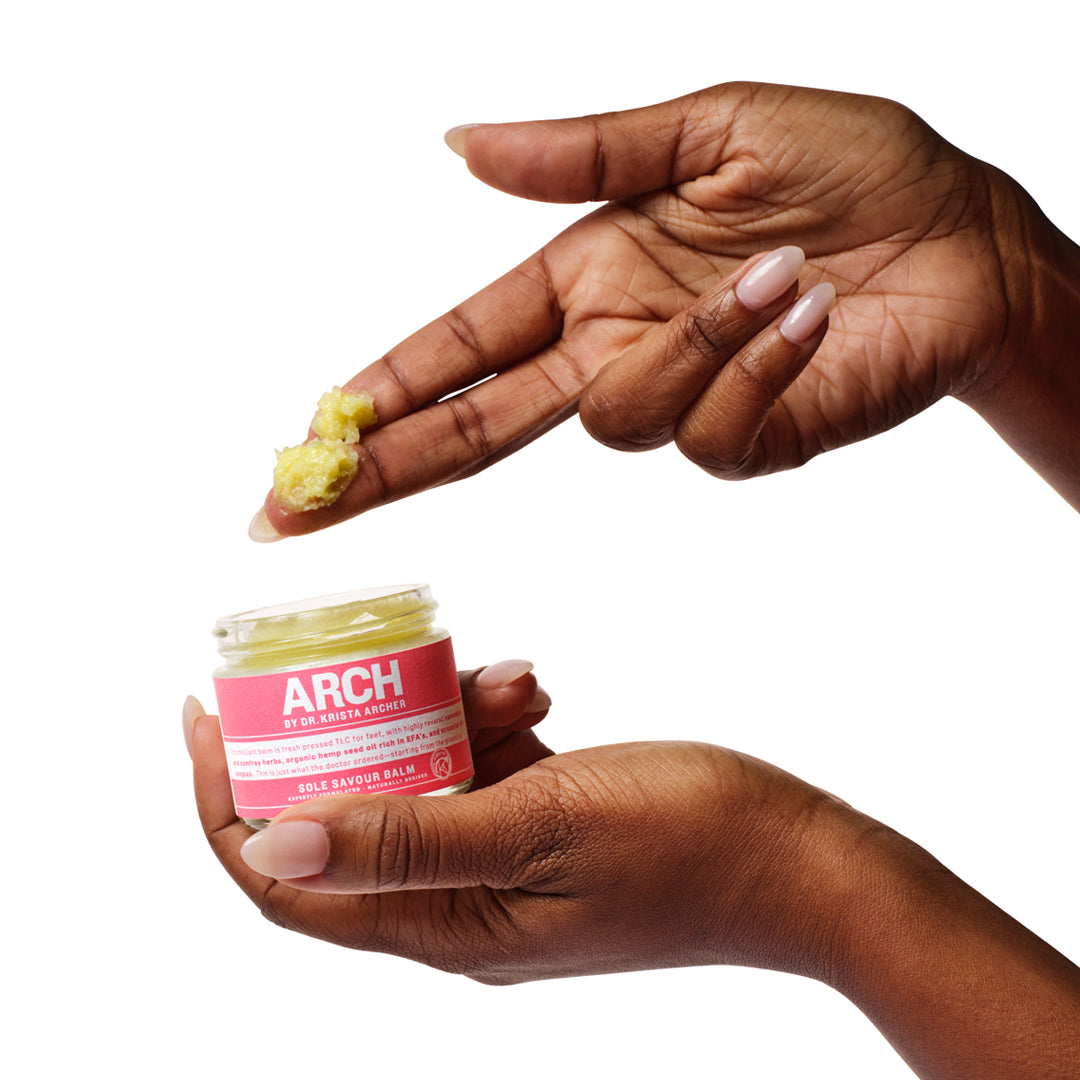 HANDS APPLYING SOLE SAVOUR BALM