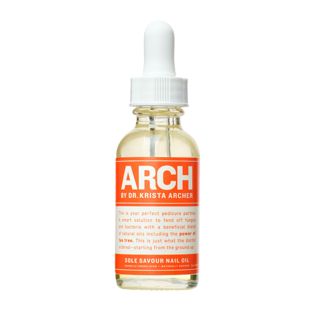 A clear glass bottle with a white dropper containing orange colored liquid, labeled as ARCH by Dr. Krista Archer.